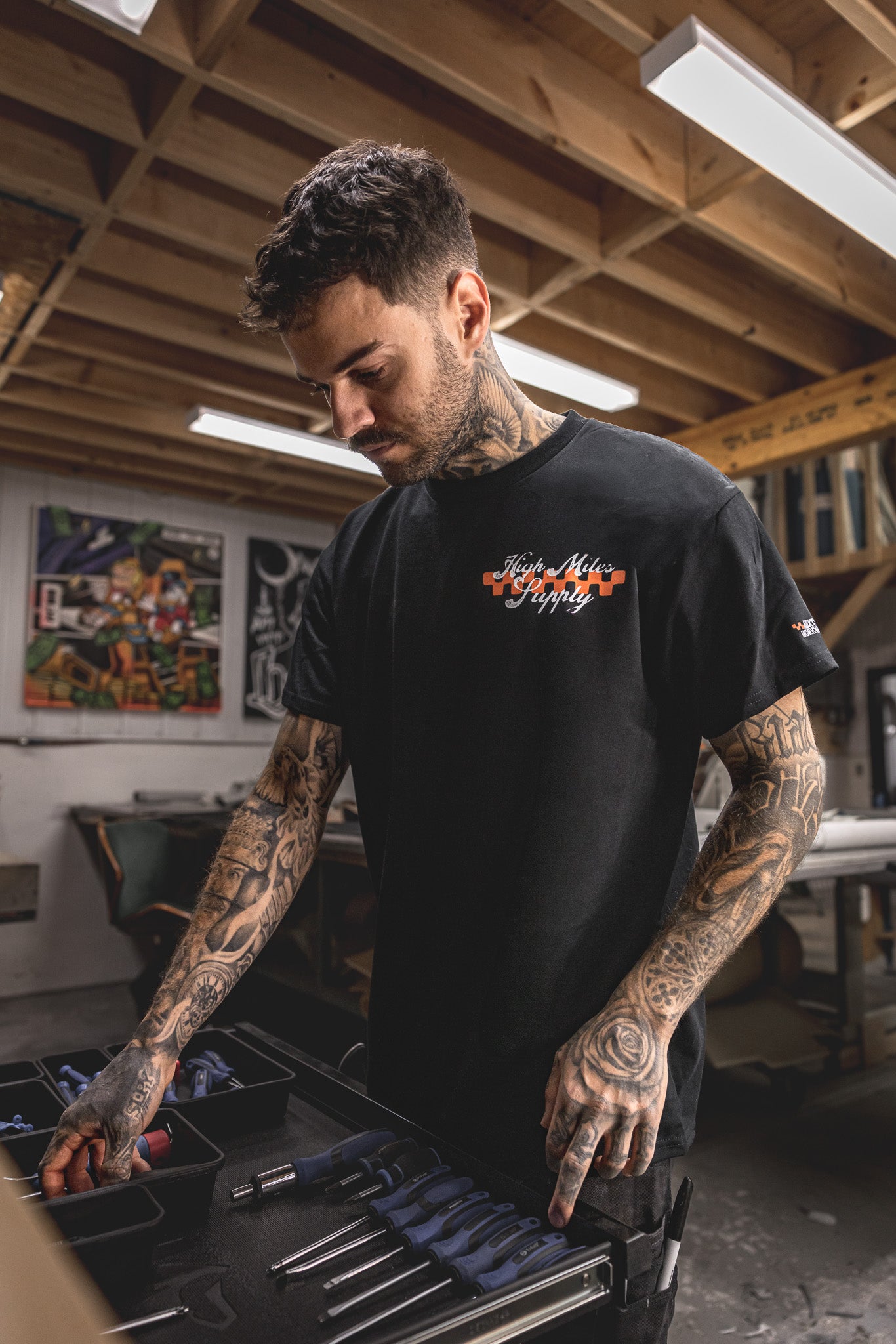 
                  
                    HX-891 "High Miles Supply" Tee
                  
                