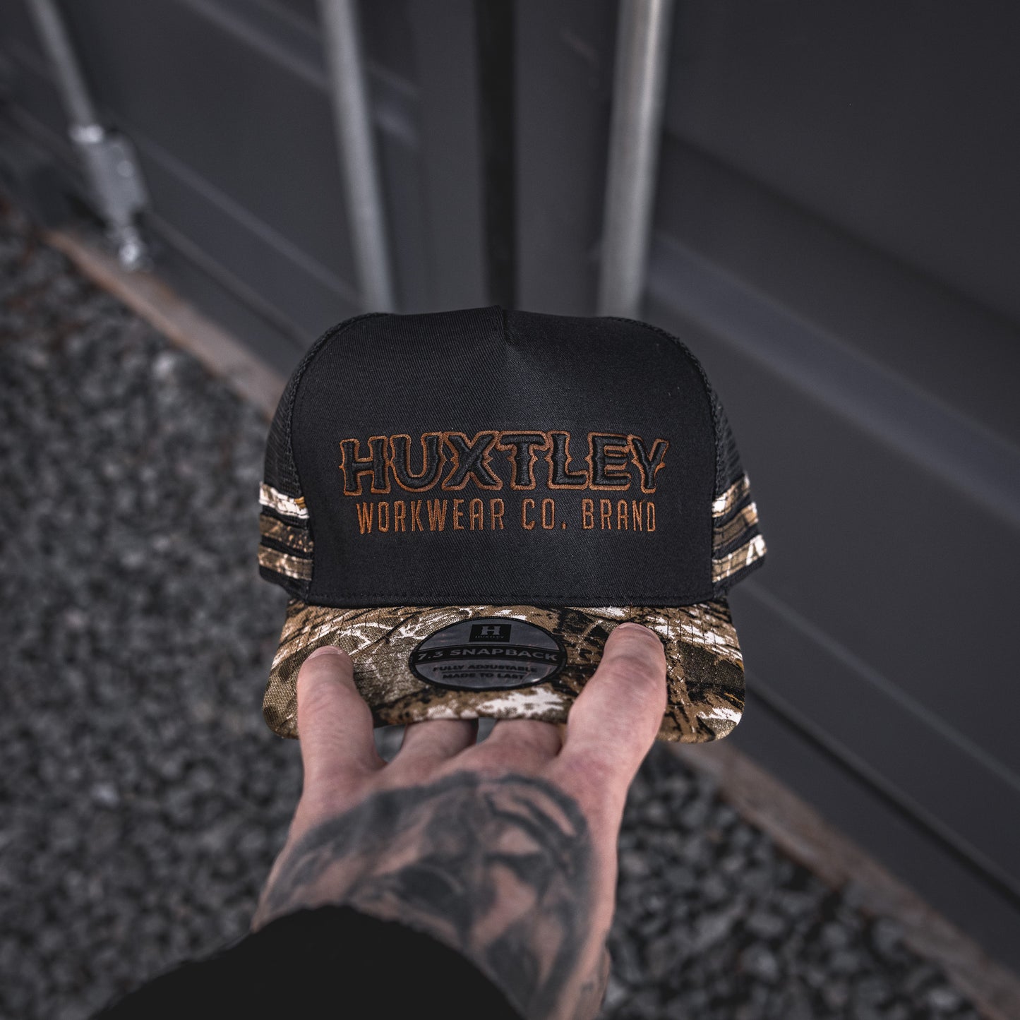 
                  
                    Casquette HS-73 "Workwear Co. Brand" Noir/ "Hunter Camo"/ Boue
                  
                