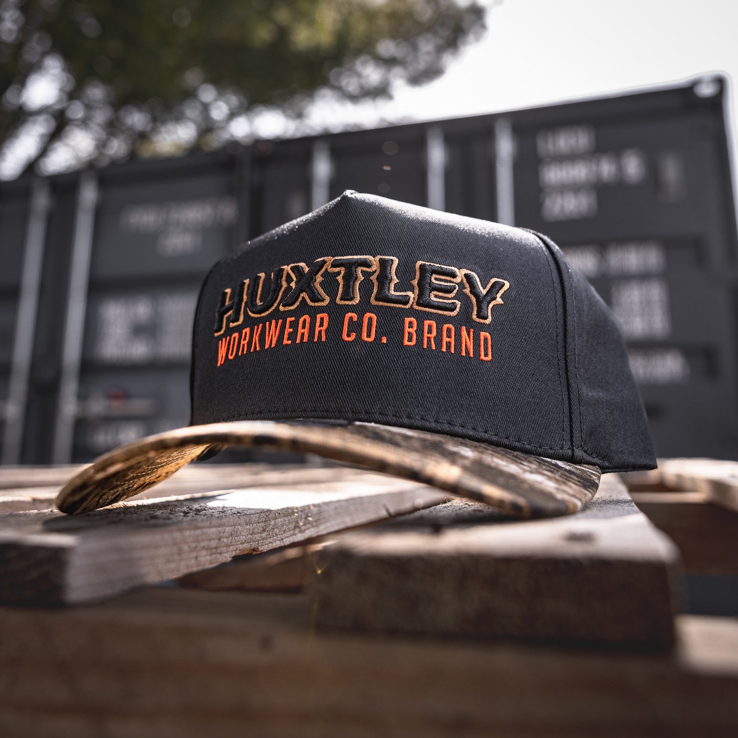 
                  
                    Casquette HS-73 "Workwear Co. Brand" Noir/ "Hunter Camo"/ Sable / Orange Néon
                  
                
