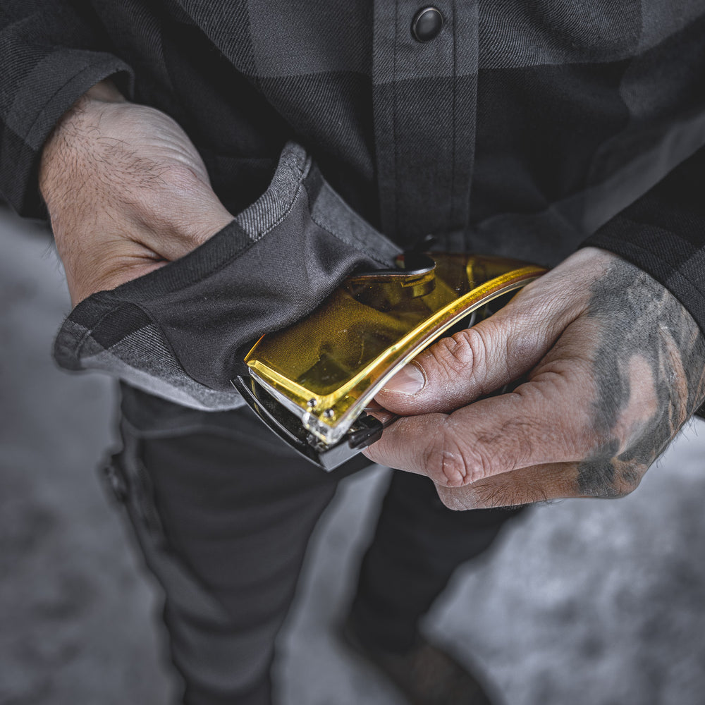 
                  
                    The Huxtley HD-57 Flex Flannel in Charcoal/Black includes a discreet built-in lens cloth inside the hem—perfect for cleaning safety glasses or visors without stopping the grind.
                  
                
