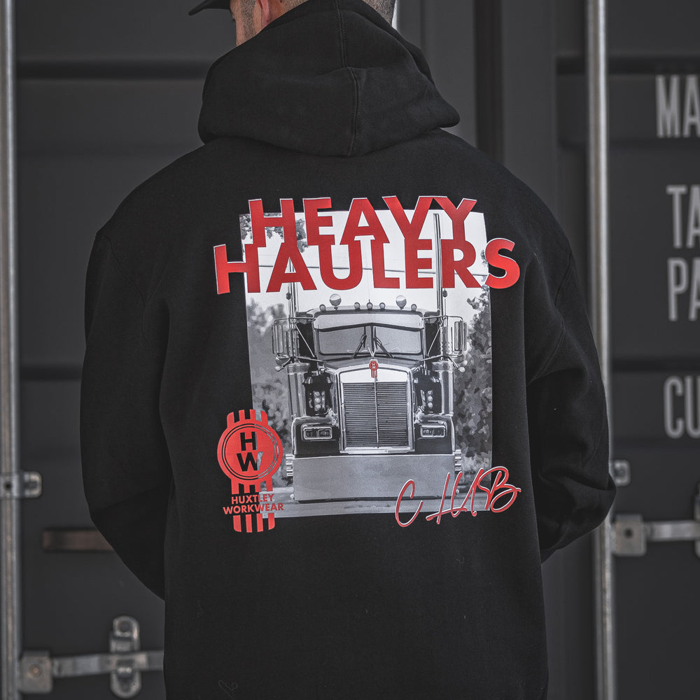 Roll heavy in the Huxtley Heavy Haulers Club Hoodie. This bold black hoodie features a full-back truck print and HW branding made for the road. Tough, warm, and built for the grind.