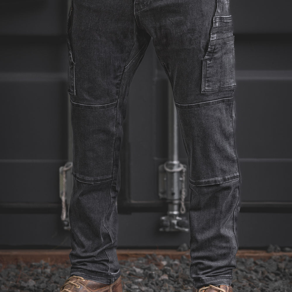 RX-1 Relaxed Work Jeans in Stonewashed Black built for comfort and durability, featuring deep utility pockets, articulated knees, and a roomy cut ideal for long days on the job.