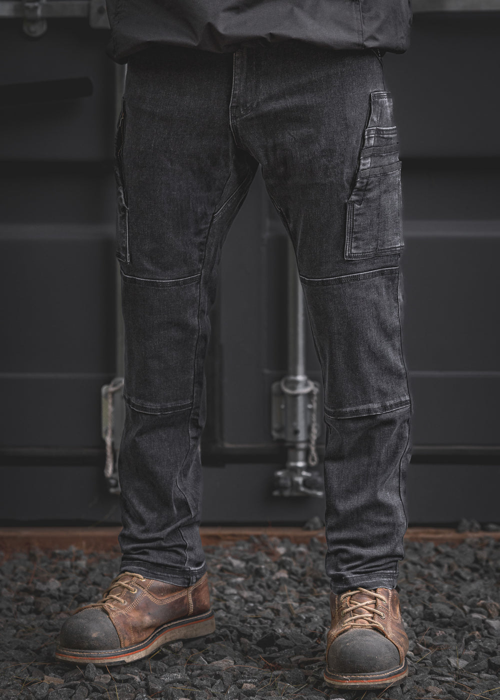 RX-1 Relaxed Work Jeans in Stonewashed Black built for comfort and durability, featuring deep utility pockets, articulated knees, and a roomy cut ideal for long days on the job.