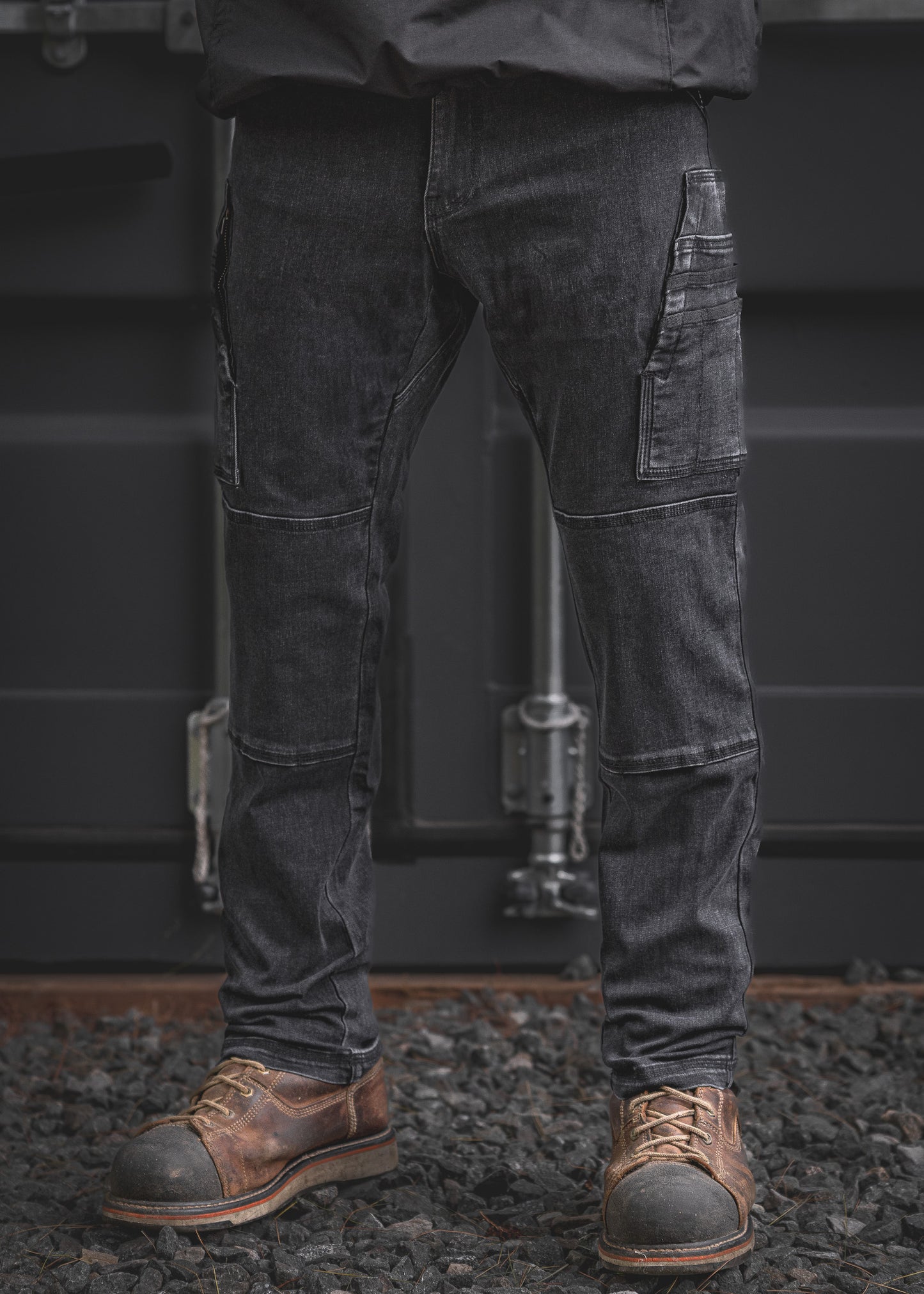 RX-1 Relaxed Work Jeans in Stonewashed Black built for comfort and durability, featuring deep utility pockets, articulated knees, and a roomy cut ideal for long days on the job.