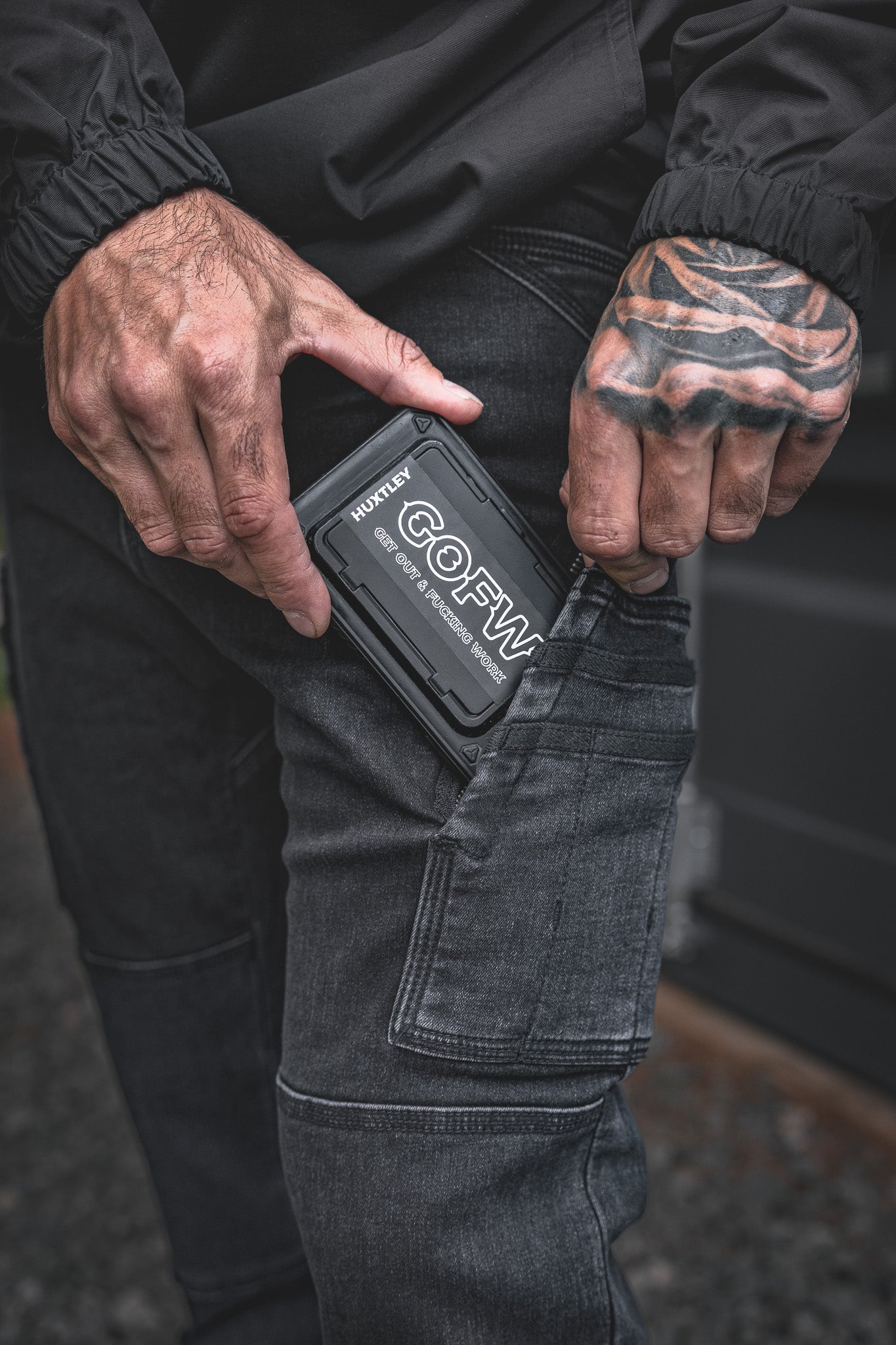 
                  
                    Detailed shot of the RX-1 Relaxed Work Jeans in Stonewashed Black. The side utility pocket fits small tools or a phone perfectly. Built for hard work and easy access.
                  
                