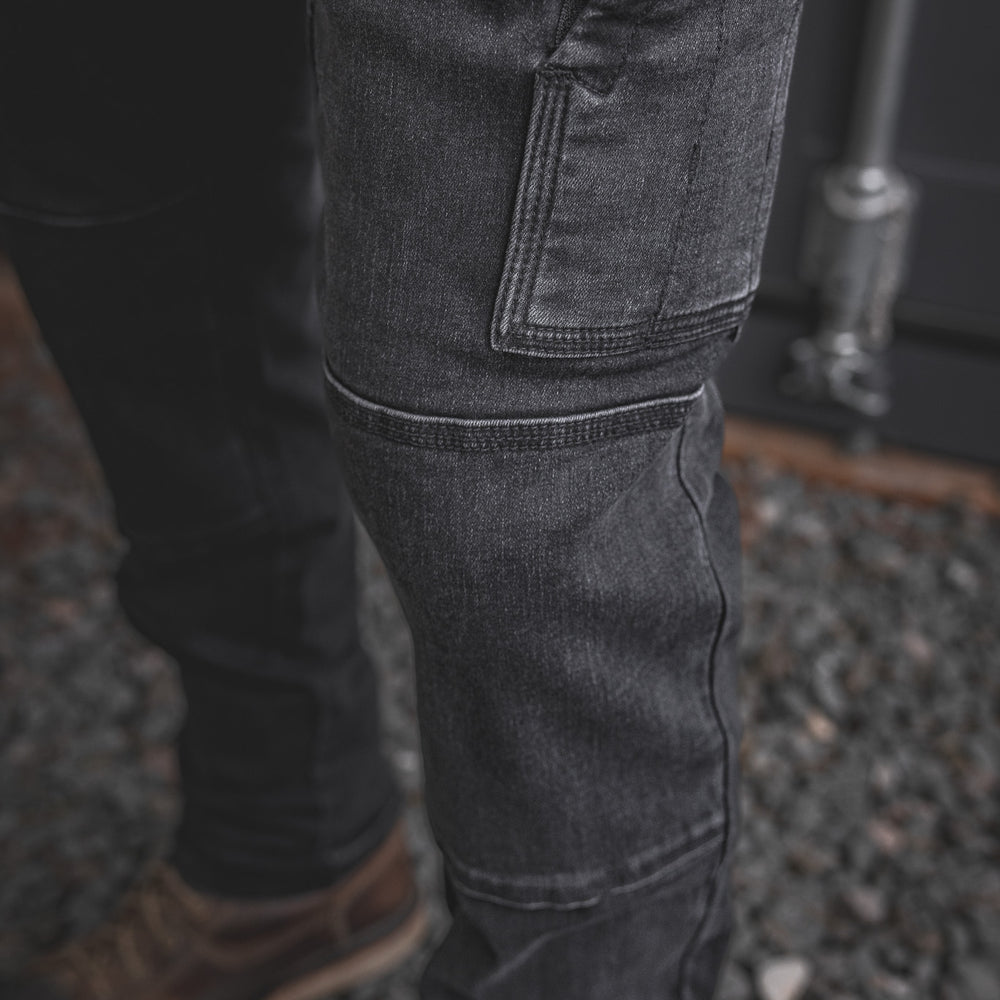 
                  
                    Close-up of the RX-1 Relaxed Work Jeans in Stonewashed Black, showcasing reinforced utility pocket and articulated knee panel built for the toughest workdays.
                  
                