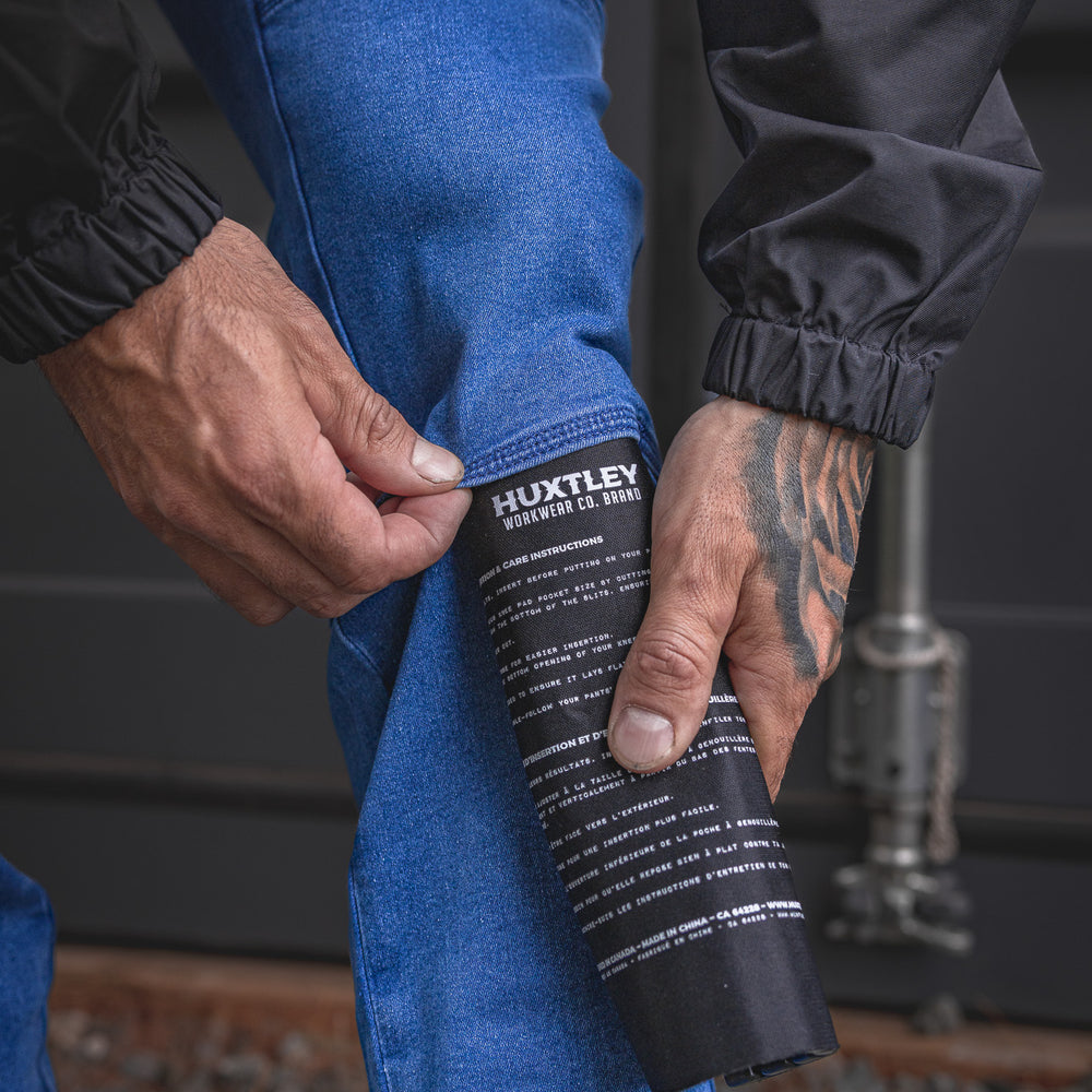 
                  
                    RX-1 Relaxed Work Jeans in Stonewashed Blue shown with kneepad insertion—designed for extra protection and jobsite comfort with a built-in pocket ready for the grind.
                  
                